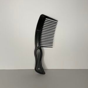 A large wide‑tooth comb is an essential styling tool designed to gently detangle and manage all hair types with ease.