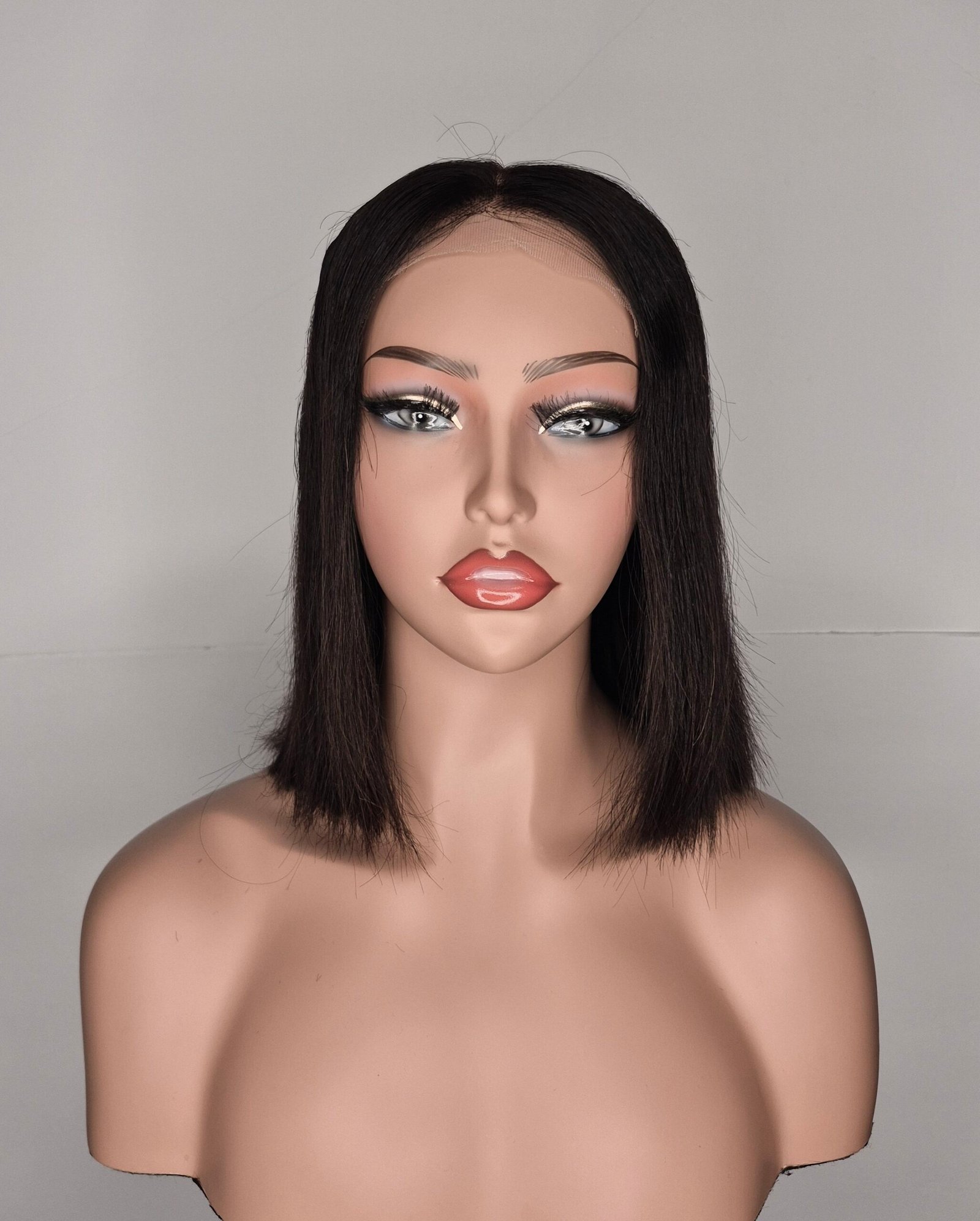This 5×5 Glueless HD Lace 10-inch Natural Wig delivers a sleek, effortless look with premium lace quality and a beginner‑friendly design.