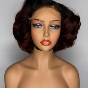 This 5×5 HD Lace Loose Wave 12-inch Wig in the shade TB/99J delivers a soft, luxurious look with a beautifully blended pop of color.