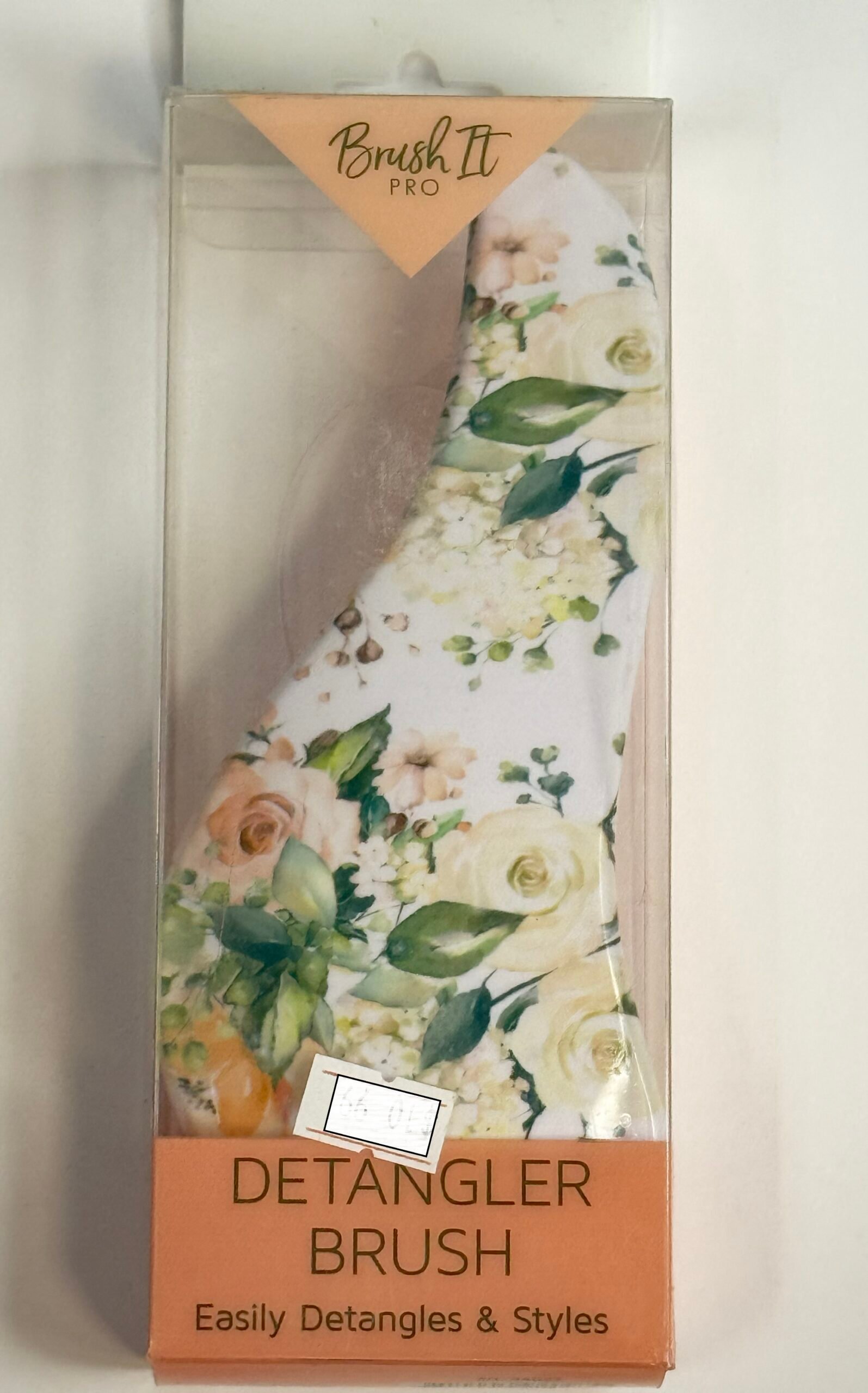 Bring a touch of beauty to your daily routine with this Flower Design Tangle‑Free Hair Brush.