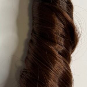 French curl 18-inch 1B/33 extensions are a beautiful braiding hair option that blends neat structure with soft, flowing curls for a chic, boho-inspired look.